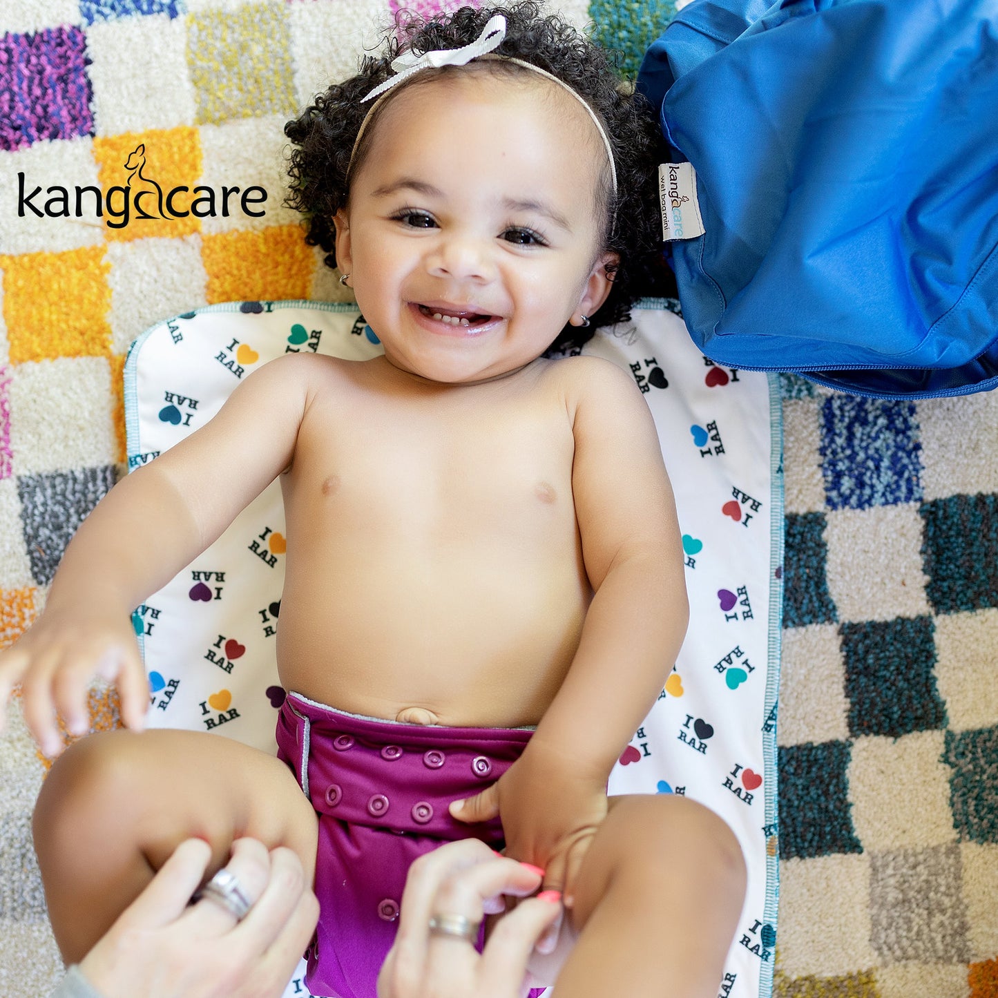 Kanga Care Changing Pad & Sheet Saver - Book Club