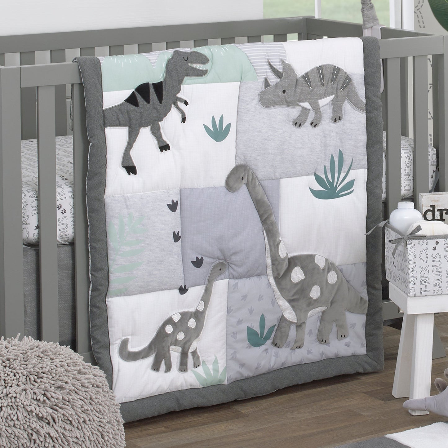 Baby-Saurus Gray, White, and Green Triceratops,  Brontosaurus, and Tyrannosaurus Dinosaurs with Mountains and Leaves 4 Piece Nursery Crib Bedding Set - Comforter, 100% Cotton Fitted Crib Sheet, Crib Skirt, and Storage